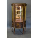 A French Vernis Martin Style Vitrine, the door painted with figures enclosing glass shelves,
