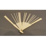 A Set of late 19th/Early 20th Century Carved Ivory Sticks and Guards for a Fan, the guards each