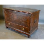 A Victorian Pine Blanket Chest, the moulded hinged top enclosing a candle box and drawers, the