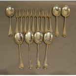 A Victorian Silver Canteen of Flatware comprising nine three pronged forks and seven spoons,