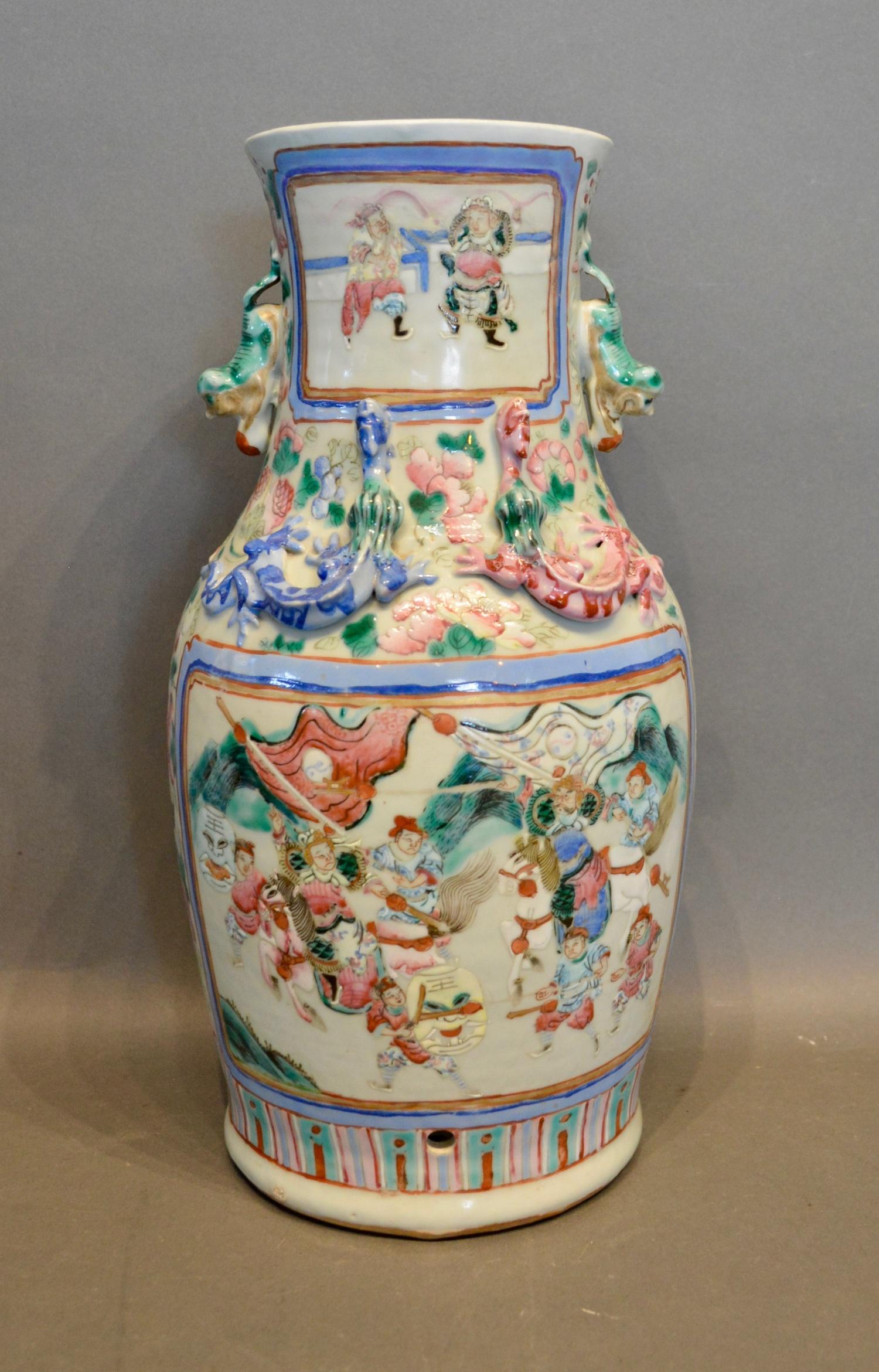 A 19th Century Canton Vase decorated in polychrome enamels with figures within landscapes, 34cm tall - Image 2 of 4