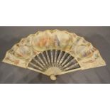 An 18th Century Carved Ivory Fan, the skin leaf hand painted with classical figures within