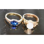 A 14 Carat Gold Moonstone Set Ring, together with a yellow metal sapphire set dress ring, 4 grammes