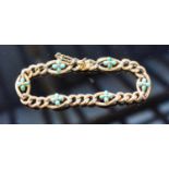 A 15 Carat Gold Linked Bracelet set with turquoise flower head, 20.3 grammes