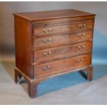 A 19th Century Mahogany Satinwood Crossbanded and Inlaid Bachelor's Chest, the moulded top above a