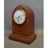 An Edwardian Mahogany Lancet Clock, the enamel dial with Arabic numerals and two train movement
