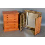 A Six Drawer Tabletop Collectors Cabinet, together with a gilt triple folding dressing table mirror