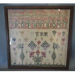 A 19th Century Woolwork Sampler, 40 x 40cm