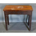 A 19th Century Mahogany Chippendale Style Card Table, the foldover top with baize lined interior and