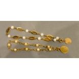A 14 Carat Gold Pearl Set Bracelet, together with another similar 14 carat gold pearl set