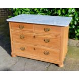 A Pine Washstand, the variegated marble top above two short and two long drawers with brass