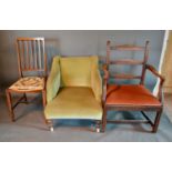A Victorian Upholstered Low Seat Chair, together with a mahogany rail back armchair and an Edwardian