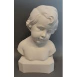A Reconstituted Marble Bust in the form of a boy, bearing signature Daniel, 25cm tall