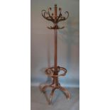 A Bentwood Hat and Coat Stand with shaped supports, 202cm tall