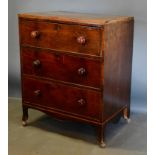 A 19th Century Mahogany Chest of Drawers, the crossbanded inlaid top above three long drawers with