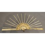 A Set of 19th Century Carved Sticks and Guards for a Fan, the sticks with pierced mother of pearl