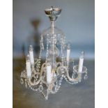 A Cut Glass Five Branch Chandelier with facet cut glass drops