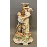 A Sitzendorf Porcelain Hand Painted Lamp Base decorated with two figures by a tree and with shaped