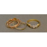 A 14 Carat Yellow Gold Dress Ring set three paste stones, together with a 14 carat triple link ring,
