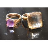 A Yellow Metal Dress Ring Set Large Citrine, together with another similar yellow metal amethyst set