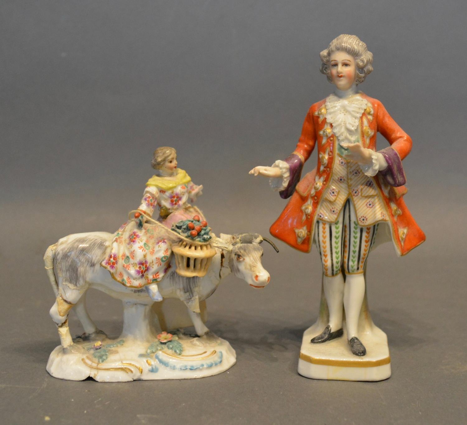 A 19th Century German Porcelain Group in the form of a girl on a cow, together with a similar German