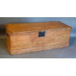 A Pine Chest with end handles and iron escutcheon, 125cm wide, 50cm deep, 42cm high