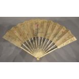 A Mid 18th Century English Fan, the pierced leaf with foliate painting, with carved sticks and