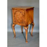 An Early 20th Century Walnut Queen Anne Style Bedside Cabinet, the moulded top with pinched