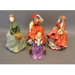 A Royal Doulton Figurine, Top of the Hill, HN 1834, together with another, Buttercup HN 2399,