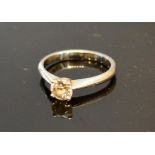 A White gold Solitaire Diamond Ring with single diamond within a pierced setting, approximately 0.50