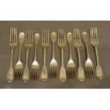 A Collection of Eleven Silver Table Forks with Fiddle pattern handles, George III and later, various
