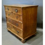 An 18th Century Walnut Chest of Drawers, the moulded crossbanded top above two short and three