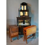 A Victorian Ebonised Standing Corner Cabinet, together with a Victorian Sutherland table and a