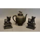 A Small Patinated Bronze Teapot, together with a pair of similar Dogs of Fo