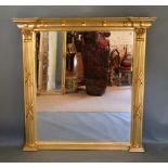 A French Style Gilded Large Overmantel Mirror with a ball pattern cornice above a rectangular