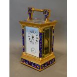 A Brass and Champleve Library Clock, the enamel dial with Roman numerals and subsidiary