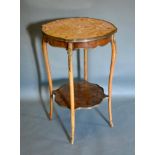 A French Occasional Table, the variegated marble top above a shaped metal mounted frieze raised upon