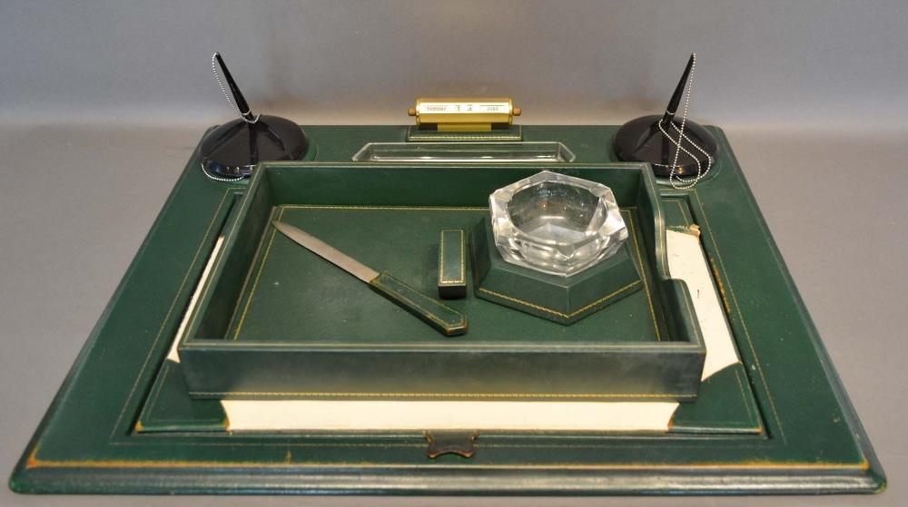 A Green Tooled Leather Desk Set with integral calendar