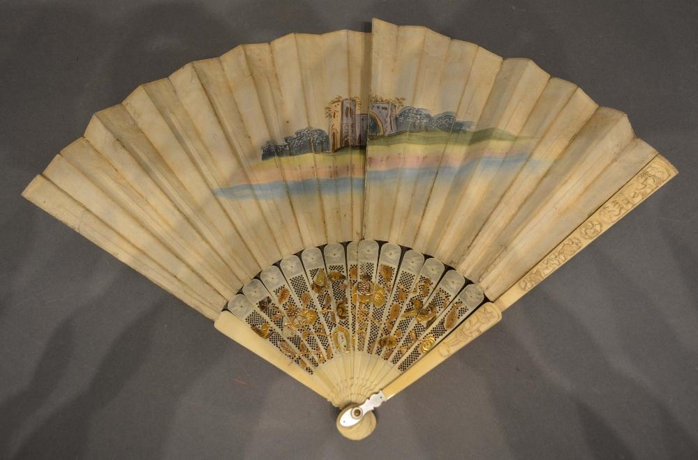 An 18th Century Fan, hand painted with classical figures within cartouches, the ivory pierced sticks - Image 2 of 2