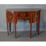 A 19th Century Mahogany Semi Bow-Fronted Serving Table of small proportions with a central drawer