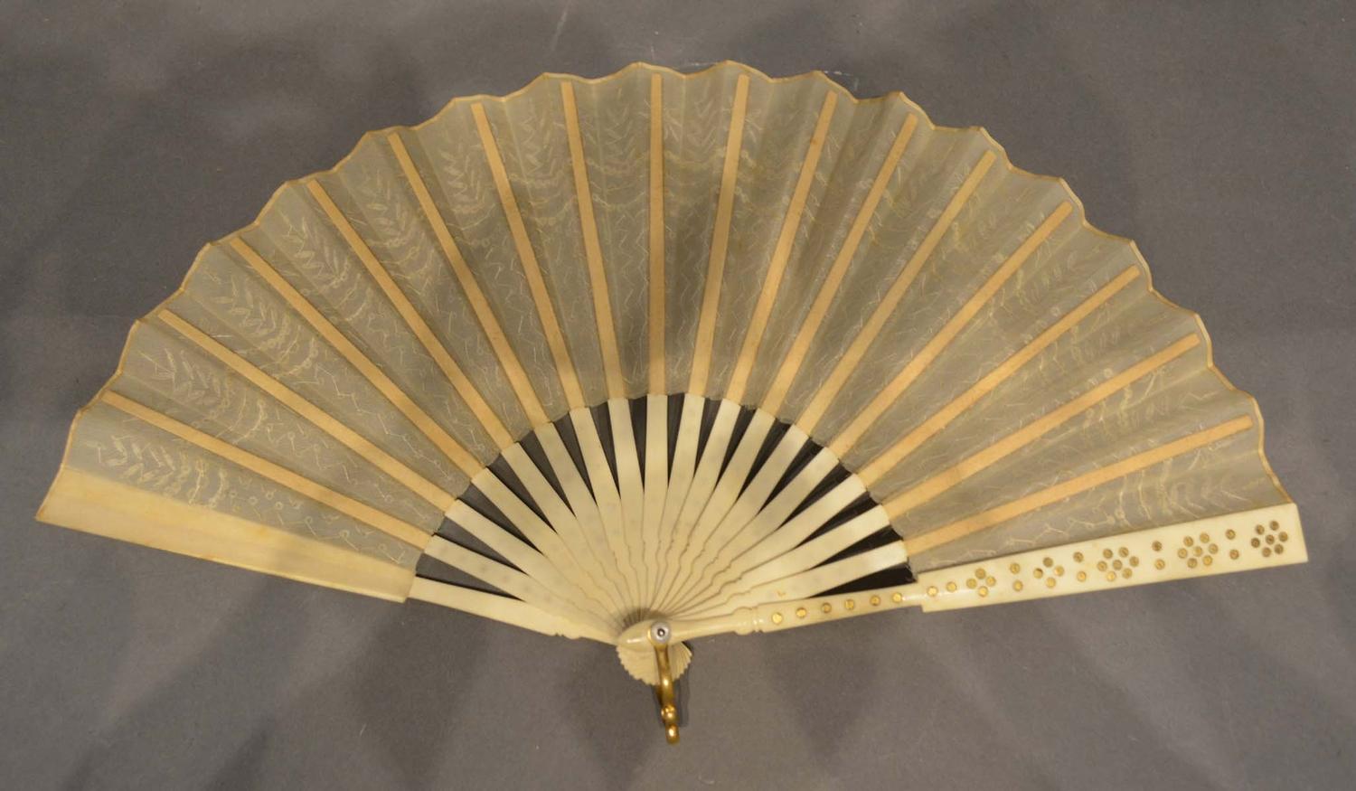 An 18th Century Ivory Fan, the gauze leaf with gold sequins with gilded sticks and guards, 19cm long - Image 2 of 3