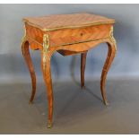 A French Kingwood and Gilt Metal Mounted Work Table, the serpentine parquetry inlaid hinged top