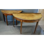 A 19th Century Mahogany Demi-Lune Side Table, the moulded top above a frieze drawer raised upon