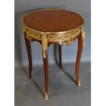 A French Style Inlaid and Gilt Metal Mounted Occasional Table, the parquetry inlaid and