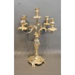 A Silver Plated Five Branch Candelabrum with shaped base and scroll feet in the rococo style, 49cm