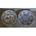 Two Chinese Underglaze Blue Decorated Large Chargers decorated with serpents amongst foliage and