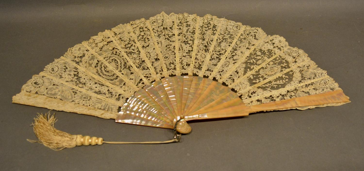 A 19th Century Brussels Mother of Pearl Fan with foliate needlepoint and woven bobbin and needle