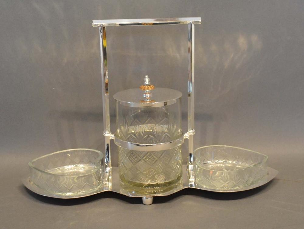 A Silver Plated and Cut Glass Hors d'Oeuvre with a central cut glass reserve flanked by heart shaped