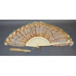 A Late 19th Century Breeze Fan made from lace bark, edged with spattia from the mountain cabbage