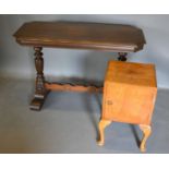 An Early 20th Century Walnut Bedside Cupboard together with a centre table